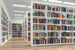 Library. Background from white bookshelves with books and textbooks.
