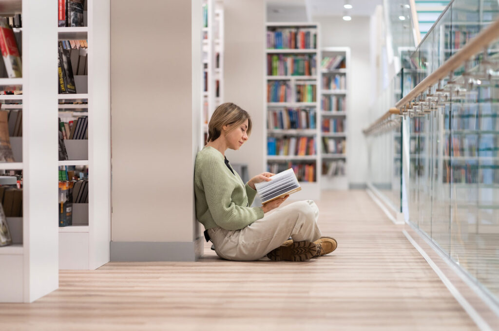 Woman reading in a library